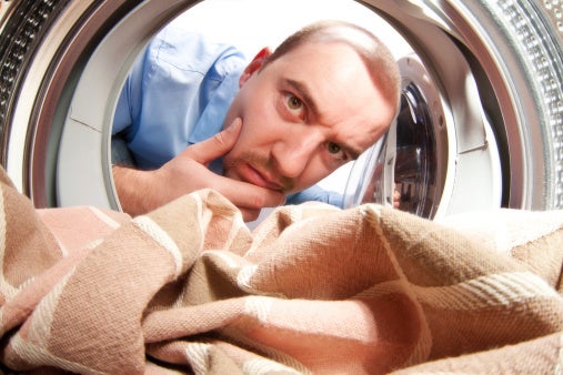 Man laundry fabric thinking