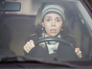 Nervous woman driving
