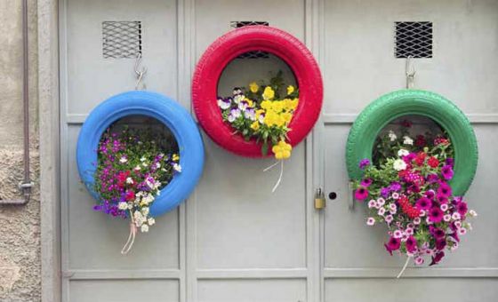 Coloured Tyres used as plant holders
