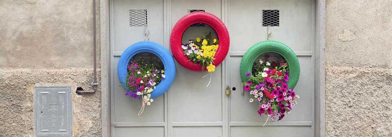 Coloured Tyres used as plant holders