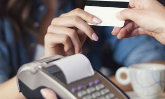 Women making payment using credit card