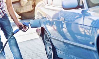 Man filling up car with petrol