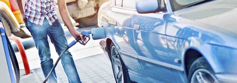 Man filling up car with petrol