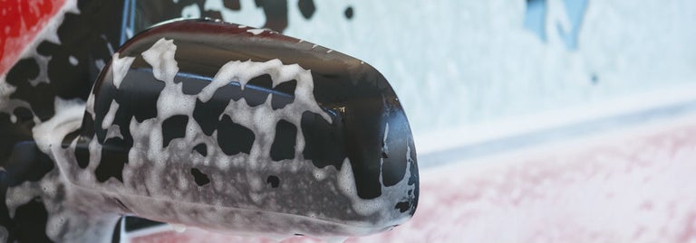 Rear view mirror with soapy water on it