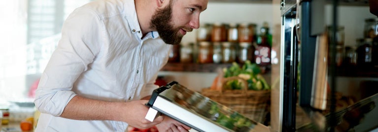 man using parmco oven