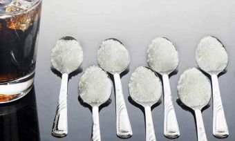 Seven spoons of sugar with soft drink