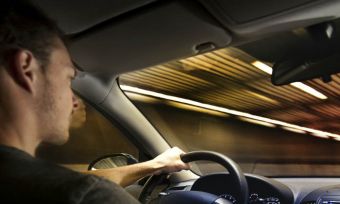 man driving in tunnel