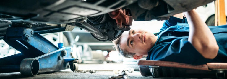 mechanic under car