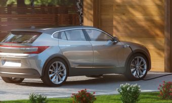 electric car charging in driveway