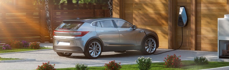 electric car charging in driveway