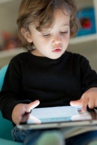 Young boy using tablet