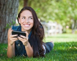 Woman mobile phone smiling